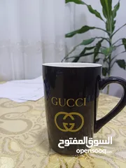  6 كوب و مج Gucci أسود داكن جميل