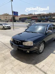  7 هيونداي افانتي xD لون اسود مميز ميتالك  موديل 2000