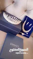  1 طقم زركون لون فضي اصلي مع علبه فخمه