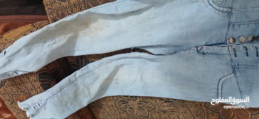  11 شروة بناطيل جينز واخذيه وملابس محير وشنط