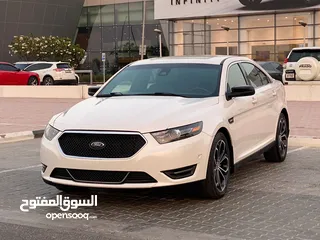  3 Ford Taurus Show 2015 white