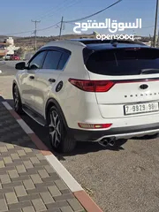  14 سبورتج ماتور 2000 ديزل 4*4 فل اضافات مع بانو راما