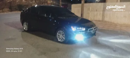  15 متسوبيشي لانسر فراشة موديل 2015 فحص مرفق مع الصور بحالة الوكاااااالة  ماشية 49 الف km  أصلي