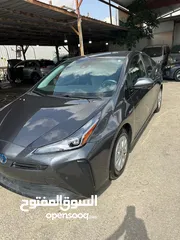  1 تويوتا بريوس موديل 2020 هايبرد بطاريه ليثيوم  فحص كامل لون فيراني فل كامل ما عدا الفتحه والجلد ممشى