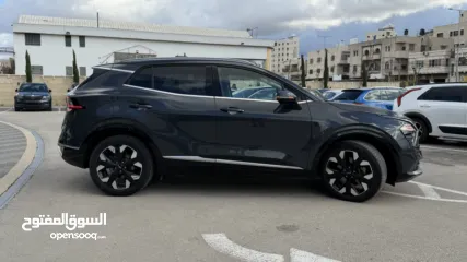  5 كيا سبورتاج ترخيص 2022 محرك 1600 هايبرد plug in/يقطع على الشحنه 65 كيلو متر  271 حصان