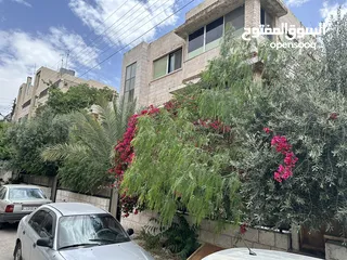  1 عمارة 8 شقق في العبدلي بجانب البوليفارد بدخل ممتاز للبيع بسعر الارض