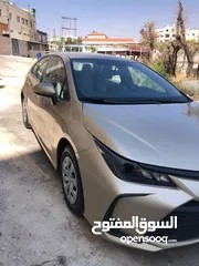  20 تويوتا كورولا 2021 لون شمباني بنزين اصلي ماتور cc1600 فحص كامل جمرك حديث
