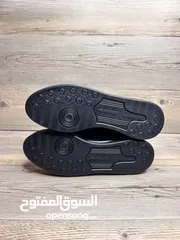  4 Adidas black shoes