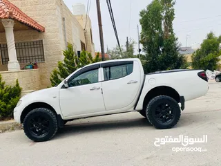  23 ميتسوبيشي L200 2011 + قطع