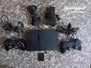  1 للبيع بلايستيشن 2 معدله تعديله اصليه بحالة الوكاله مع ميموري كارد و فلاشه 32 جيجا فيها 25 العاب