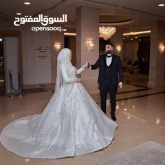  1 فستان عرايس محجبات وبظبط بدون حجاب   بتعديل بسيط  قياس مفتوح لانو من ورا ربط فخم جداً جداً جداً