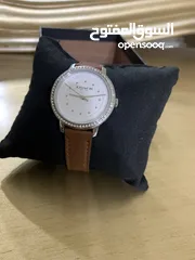  1 الساعه اصليه مع كودها وع الفحص