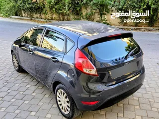  4 فورد فييستا 2014 سيارة لقطة مميزة من كل النواحي لون باطوني أصل شركة مميزة