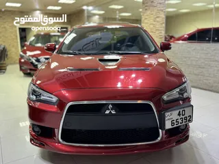  1 ميتسوبيشي لانسر موديل 2015 GT اصلي فحص كامل بحالة الوكاله فل كامل اعلى صنف من فئتها