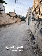  1 اعلان بيع ارض  مع 3 شقق