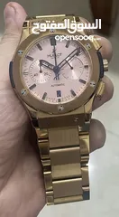  2 ساعة HUBLOT هوبليت بيج بانج لون ذهبي