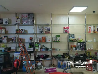  1 رفوف محلات تجارية