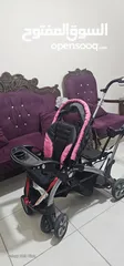  1 عربة أطفال مزدوجة مع هدية مفاجأة " بحالة ممتازة  وارد اميركا مناسبة لطفلين (طفل رضيع في المقدمة +طفل
