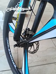  10 دراجة هوائية من نوع SPORTS INC من طراز SHIMANO جنط 26 باللون الأزرق اقرأ الوصف بدقة قابل للتفاوض