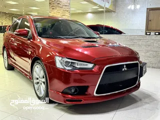  20 ميتسوبيشي لانسر موديل 2015 GT اصلي فحص كامل بحالة الوكاله فل كامل اعلى صنف من فئتها