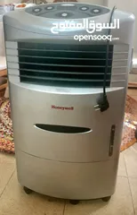  1 مكيفً صحراوي يعمل يبرد بالثلج