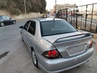  4 متسوبيشي لانسر موديل 2011