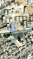 2 قطعة أرض اسكان الهاشمية الشارع الدائري واجهة على 3 شوارع مقابل ساحة مفتوحة