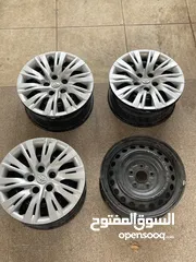  2 جنطات كامري اصلي مع طاسات