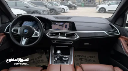  11 BMW X5 ترخيص 2022 ص   محرك 3000 هايبرد plug in/يقطع على الشحنه 80 كيلو متر  399 حصان