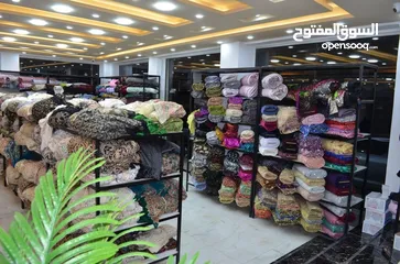  2 شركة فواز قفيشه للاقمشه والكلف