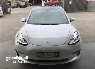  7 Tesla model 3 standard 2021  السيارة بحال الوكالة لا ينقصها شيء