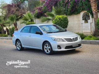 16 تويوتا كورولا 2013 1.8 بحالة الوكالة فحص ممتاز بسعر مغري