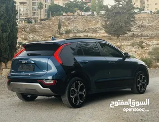  21 كيا نيرو هايبرد 2023/فل اضافات بدون فتحه/جير ماوس/امكانيه التقسيط المباشر بشيكات شخصيه وسعر مميز جدا