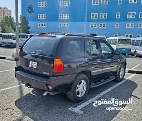  3 GMC Envoy - 2009 Burgundy