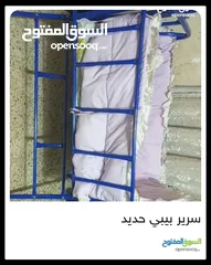  1 سرير بيبي مع هزاز معو فرشتو بحال الوكاله