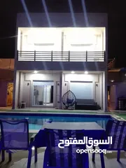  23 شاليه للايجار منطقه مطله جبل الروضه مطل ع البحر الميت وجبال فلسطين مسبح مغطى من اشعه الشمس