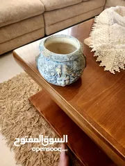  10 مزهرية عتيقة مزخرفة بوجه - لمسة من التراث في منزلك