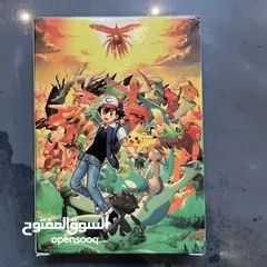  16 كروت بوكيمون والبومات (Pokemon cards and binders)