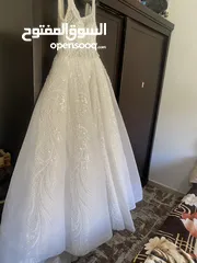  4 فستان عرس بسعر حرق