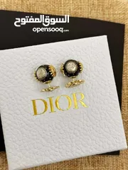  2 Christian Dior earrings