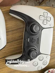  5 بلايستيشن 5 نسخة السي دي مع ايدتين و قاعدة شحن ومروحة تبريد و لعبة ريد ديد ريديمشن 2