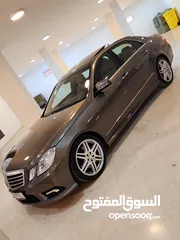  2 مرسيدس E200 CGI 2011 AMG Panorama  Avenguard بحالة الوكاله عداد 113 فحص كامل لون نحاسي دهان الوكاله