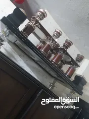  1 طاولات قزاز نفس الصوره وحده كبيره وثنتين صغار
