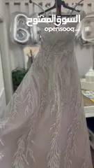  6 فستان سهرة فضي لامع ببطانة نهدي فاتح  مميز و ثقيل يناسب اخت عروس او اخت عريس  قماشته واقفة و جميلة