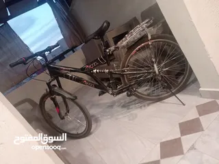  1 بسكليت جنط 24  7 غيارات خلفي و 3 غيارات أمامي مع باسكت فضي و جناحين أمامي