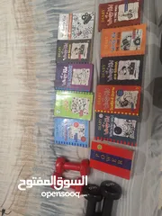  1 كتب wimpy kid و 48 laws of power و دمبلز