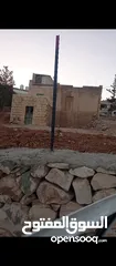  1 للبيع ارض 800 متر في الشواورة مع منزل صغير