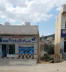  1 طابق ارضي تجاري ومحل بنفس المجمع للايجار