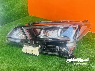  1 اضوية امامية نيسان ليف 2018-2024   وارد اليابان وامريكي عاكسة بيضه  ضوء امامي نيسان ليف 2020 ياباني