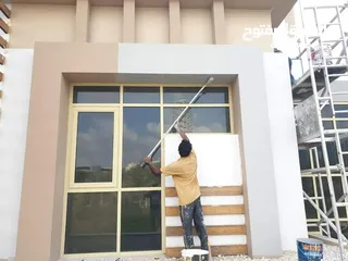  2 VILA PAINTING WORKING OUTSIDE